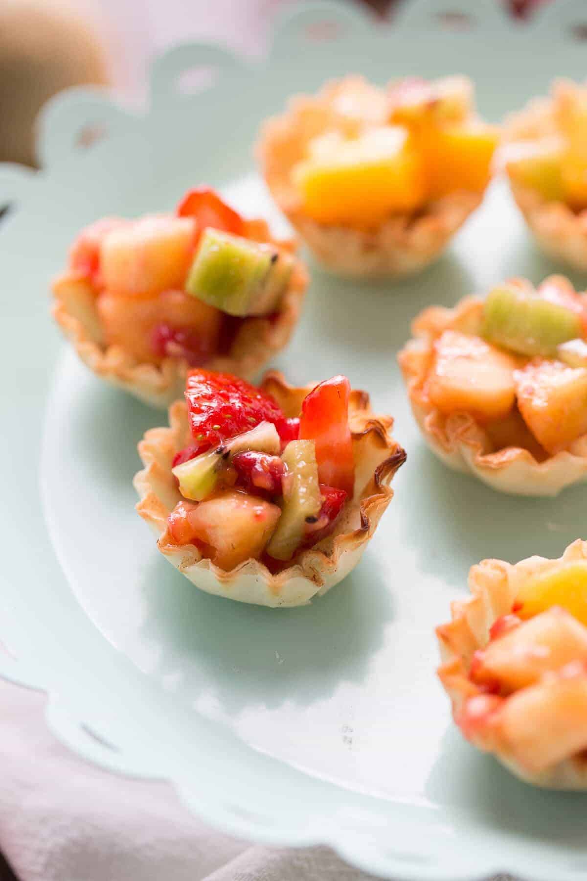 These easy fruit salsa cups are going to be a hit wherever they god! They are so simple to make!