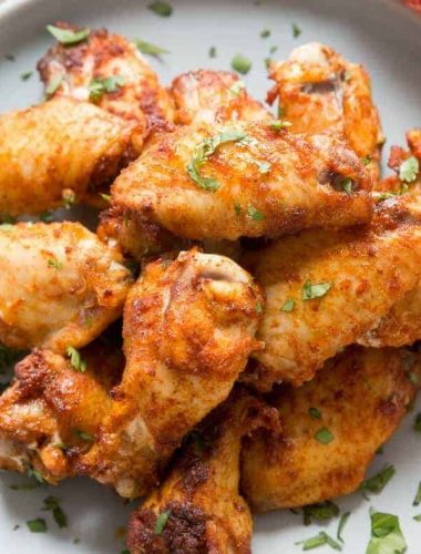 Dry rub chicken wings are like a party in your mouth! The spicy sweet coating is absolutely addictive!