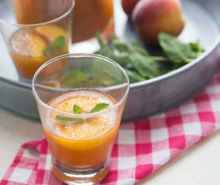 Peaches are the essence of summer, why not have a little bit of that sweet taste in your bourbon slush punch?