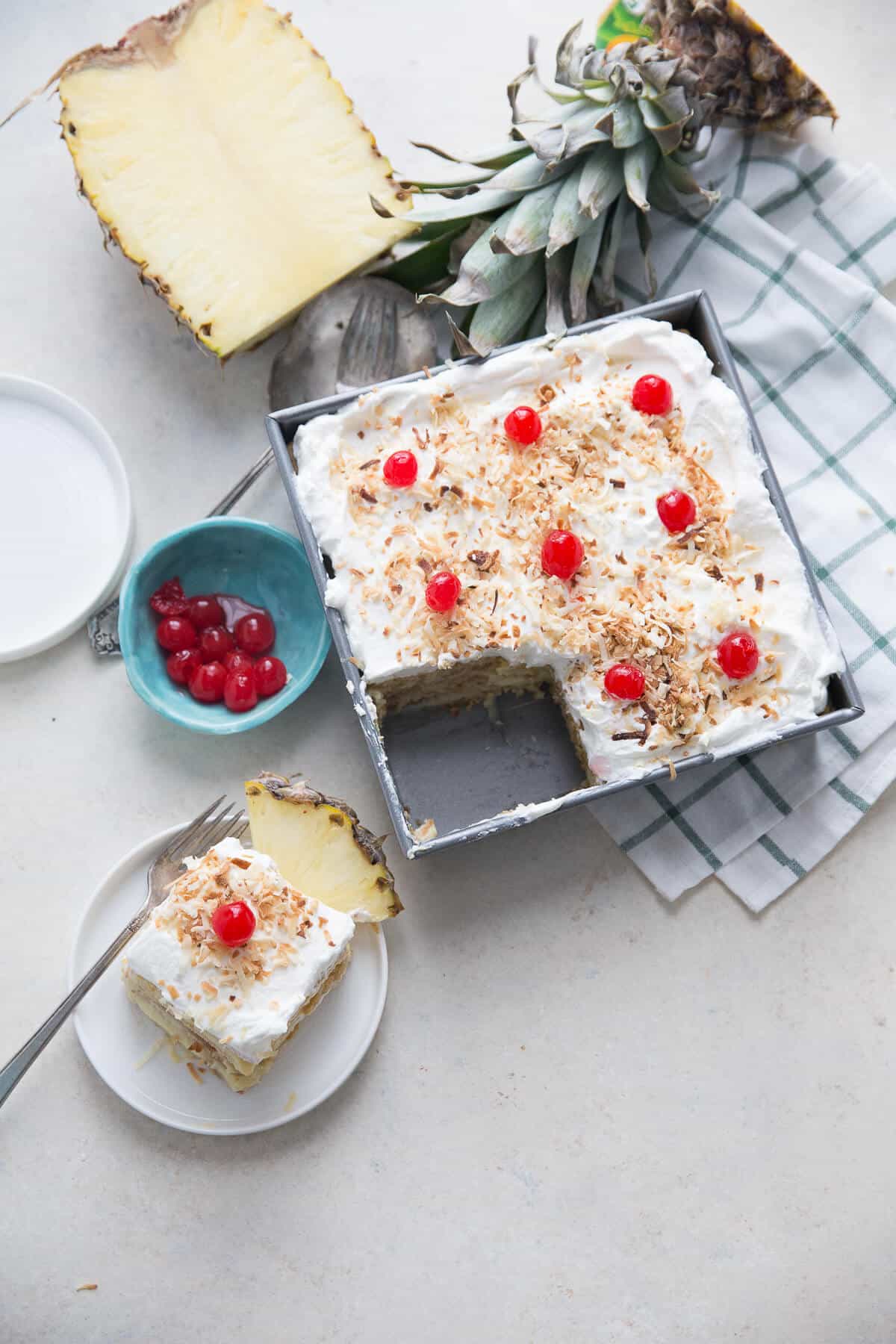 Love pina coladas? Then you will love the sweet pineapple filling and the coconut whipped cream in this easy no bake box cake