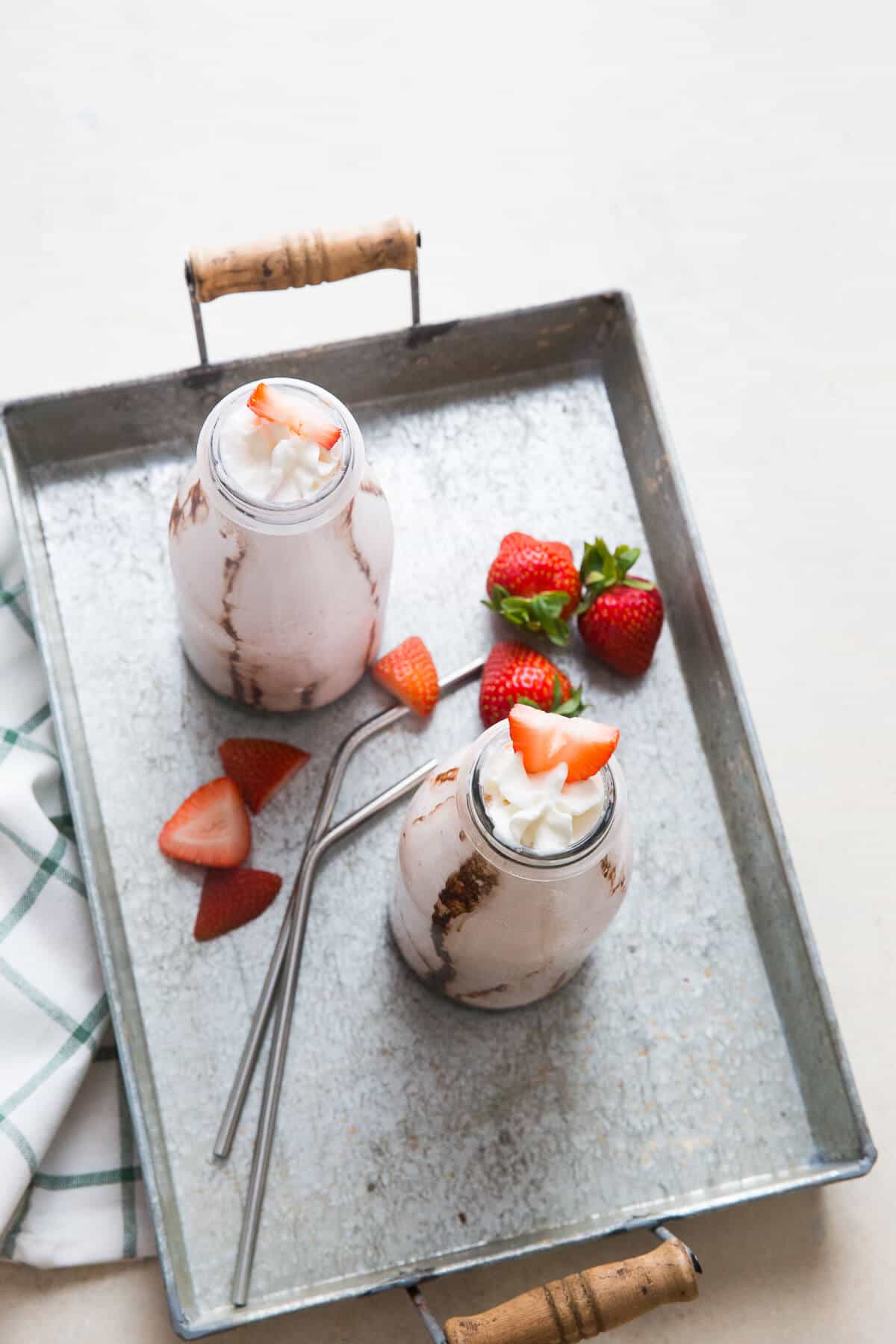 Strawberry milkshakes are always a hit, but they get so much better with booze!