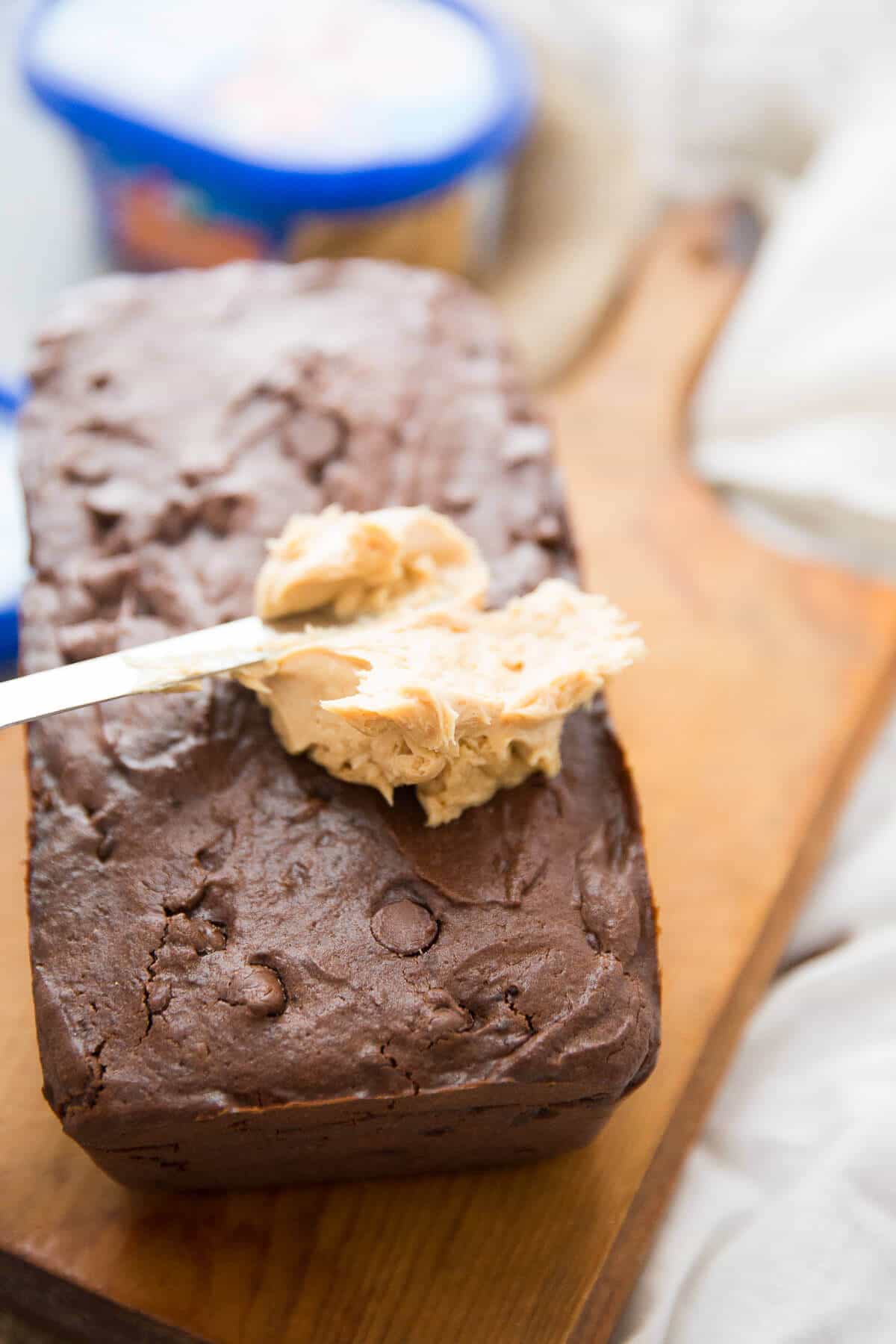 This double chocolate quick bread is decadent, moist and fudgy!  It is absolutely irresistible when topped with a creamy peanut butter frosting!