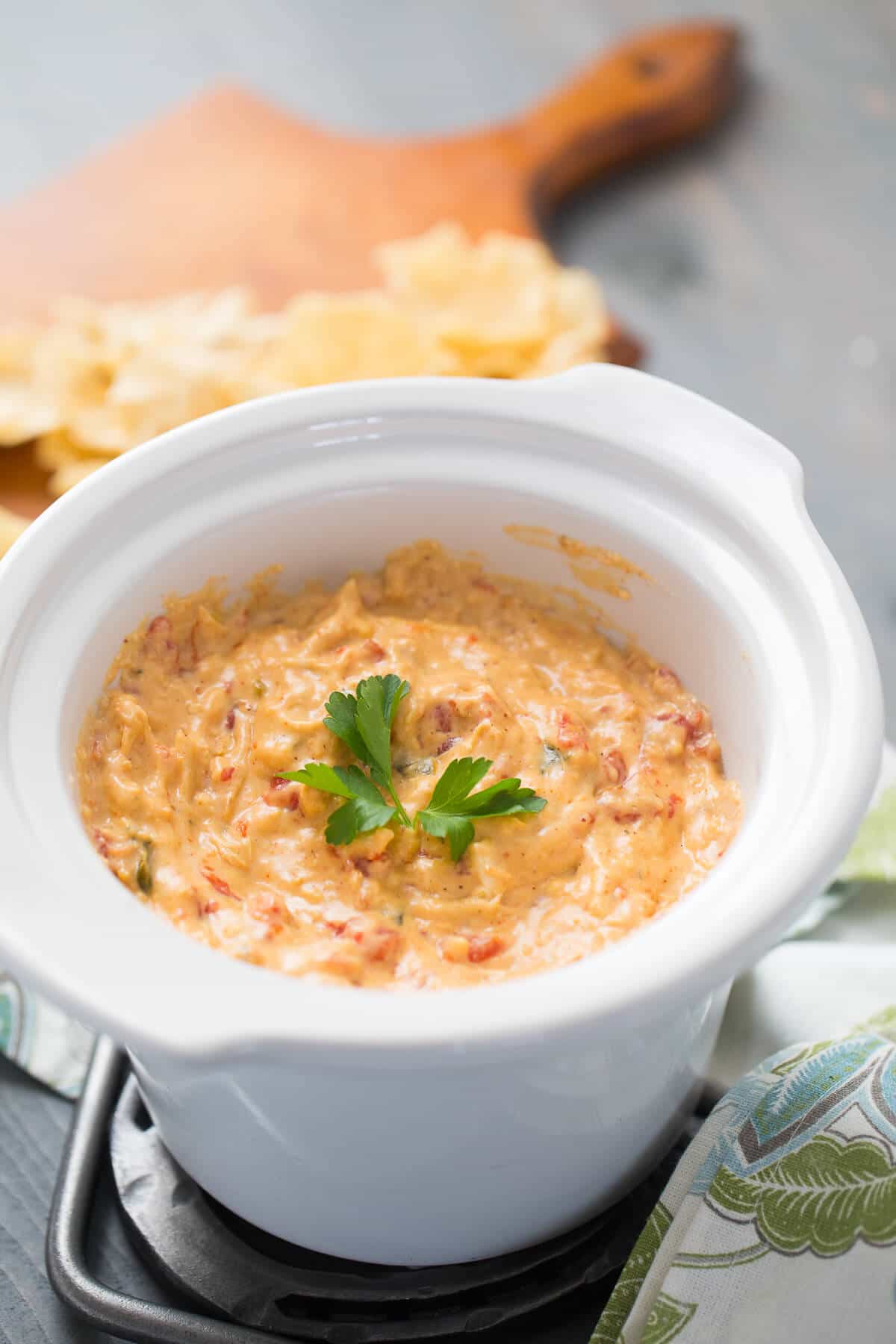 This King Ranch Chicken Dip is crockpot made and easily shared! You are going to love the the flavor; get your chips ready, you are going to need them!