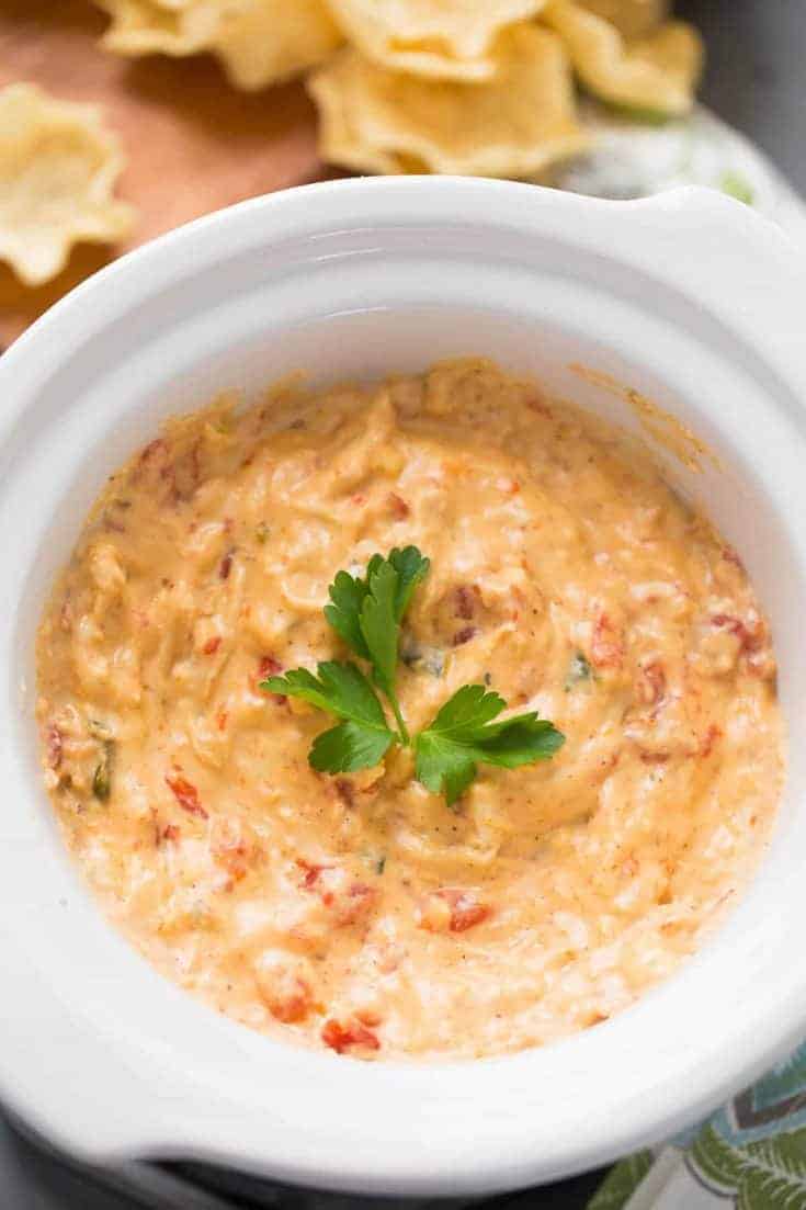 This King Ranch Chicken Dip is crockpot made and easily shared!  You are going to love the the flavor; get your chips ready, you are going to need them!