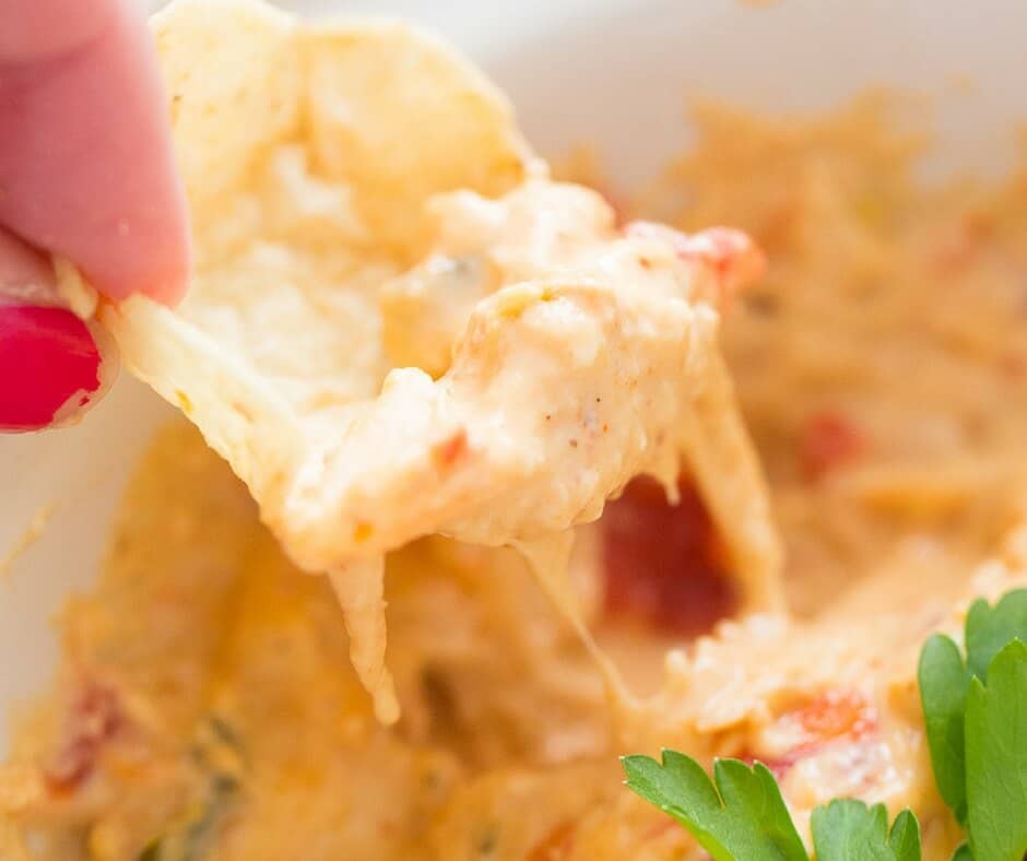 This King Ranch Chicken Dip is crockpot made and easily shared! You are going to love the the flavor; get your chips ready, you are going to need them!