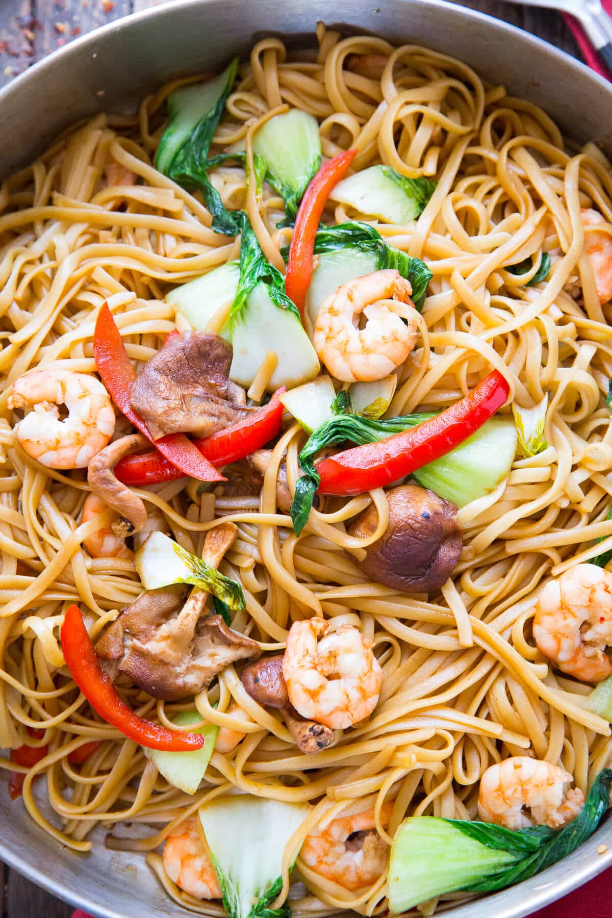 Shrimp Lo Mein is a dish that combines ease and flavor! Saucy noodles, vegetables, and shrimp make take out a thing of the past!