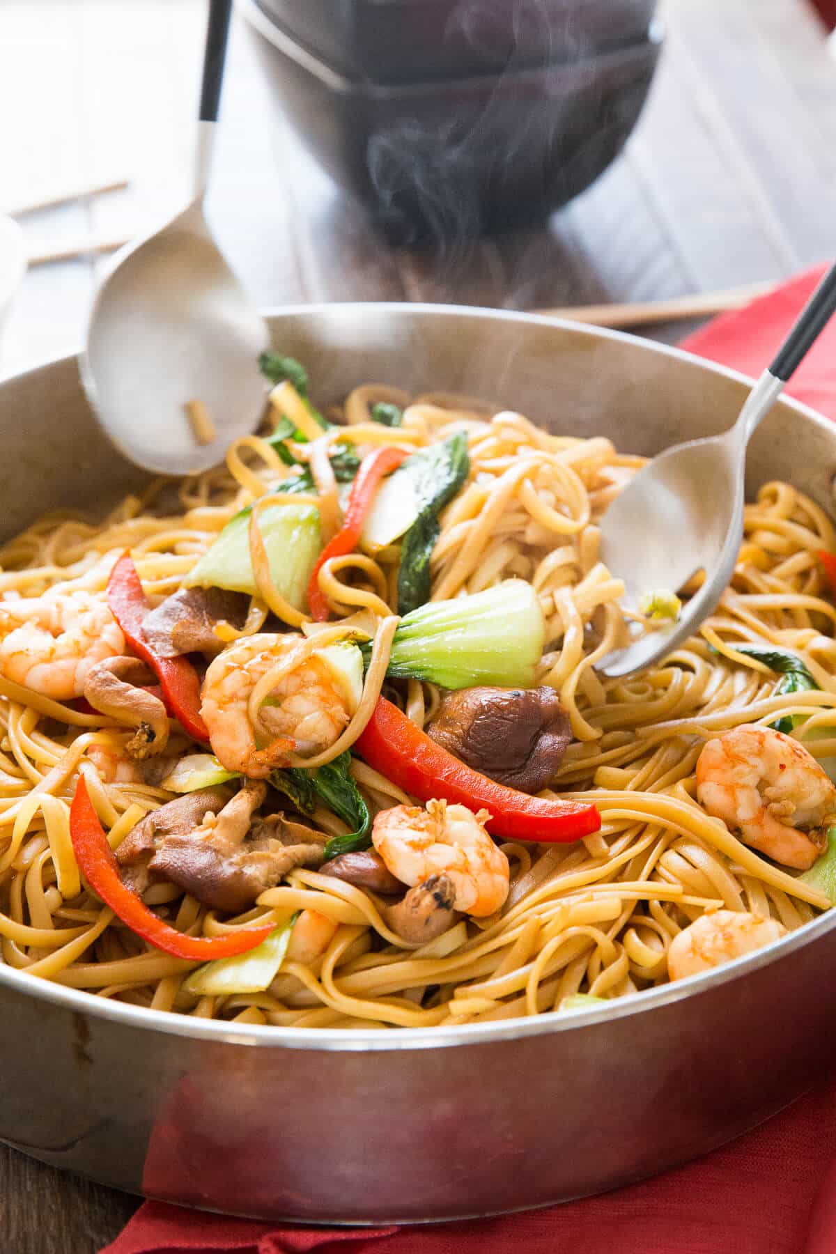 Shrimp Lo Mein is a dish that combines ease and flavor!   Saucy noodles, vegetables, and shrimp make take out a thing of the past!