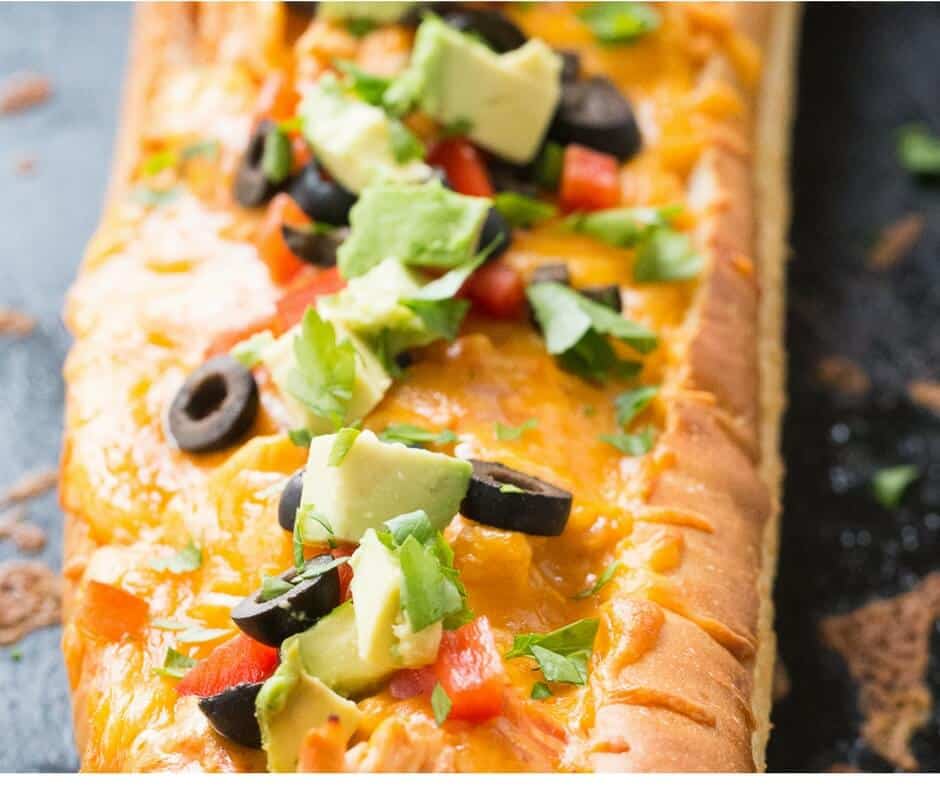 All the yummy flavors of chicken enchiladas are stuffed into a loaf of French bread! Dinner made simple!