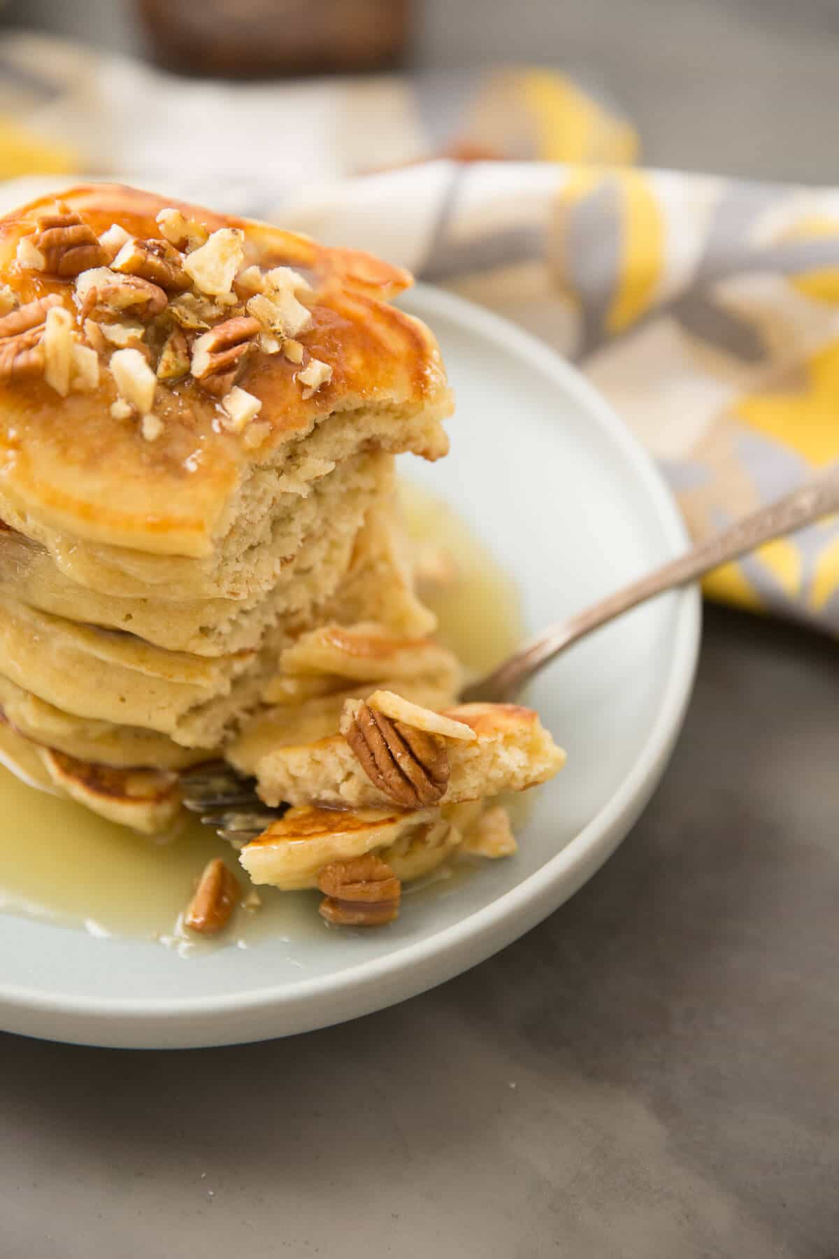 Banana's Foster makes an appearance at your breakfast table instead of the dessert table! Banana pancakes, rum flavored caramel sauce and a nutty topping elevate ordinary pancakes into something extraordinary!