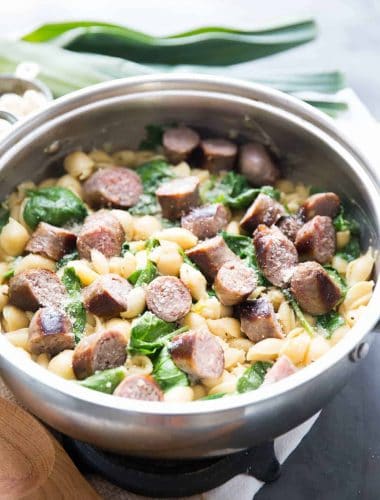 This light and creamy sausage pasta is luscious and flavorful. The spinach and leeks add color and freshness to this no-fuss recipe.  This is a great meal for busy nights!'