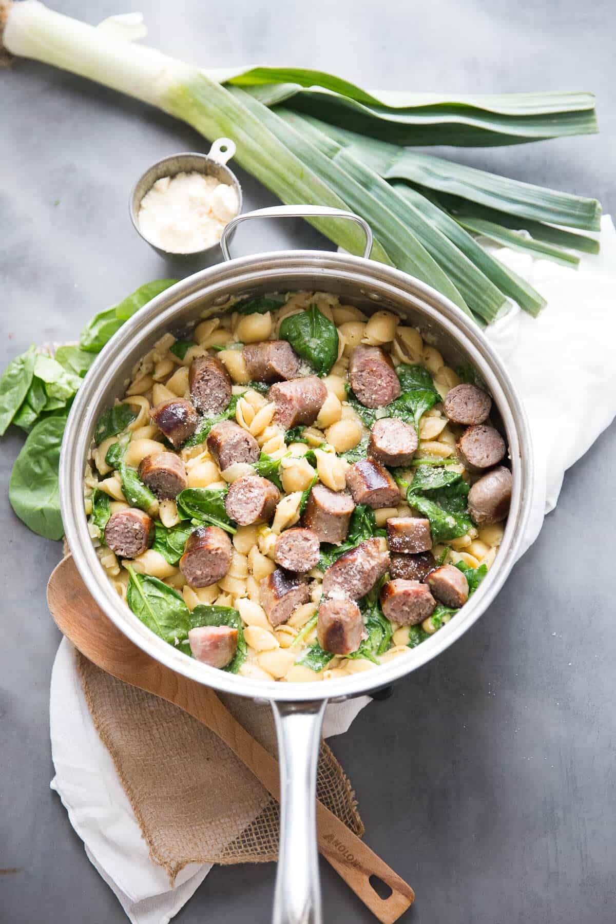 This light and creamy sausage pasta is luscious and flavorful. The spinach and leeks add color and freshness to this no-fuss recipe.  This is a great meal for busy nights!'