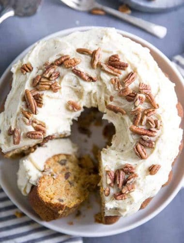 Homemade carrot cake recipe with slice on its side