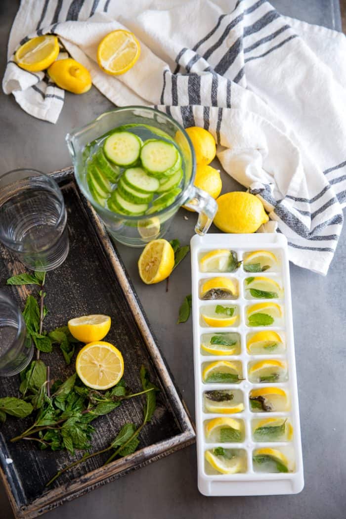 Cucumber lemon detox water pitcher with ice cubes