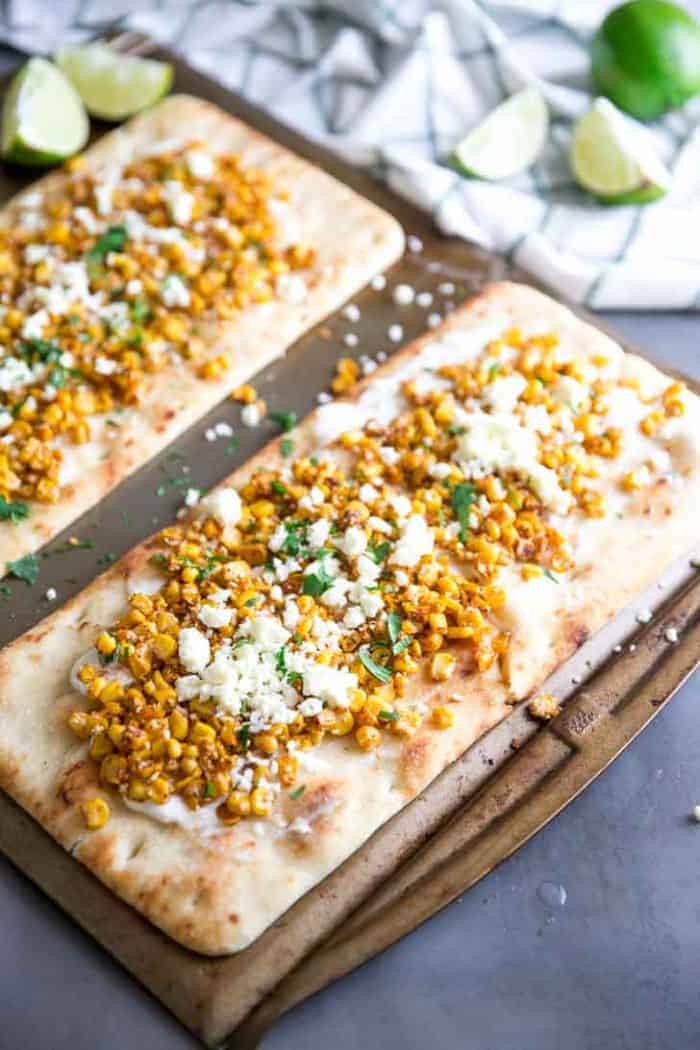 Mexican Street Corn Flatbread Pizza two on a baking sheet