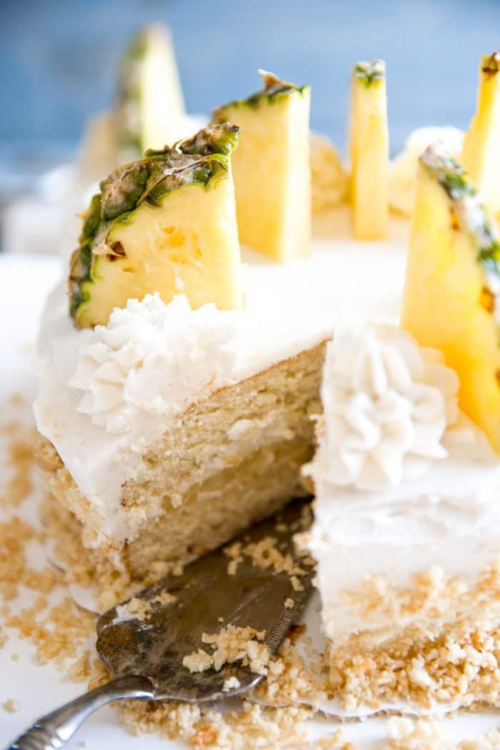 Pineapple cake with one slice out