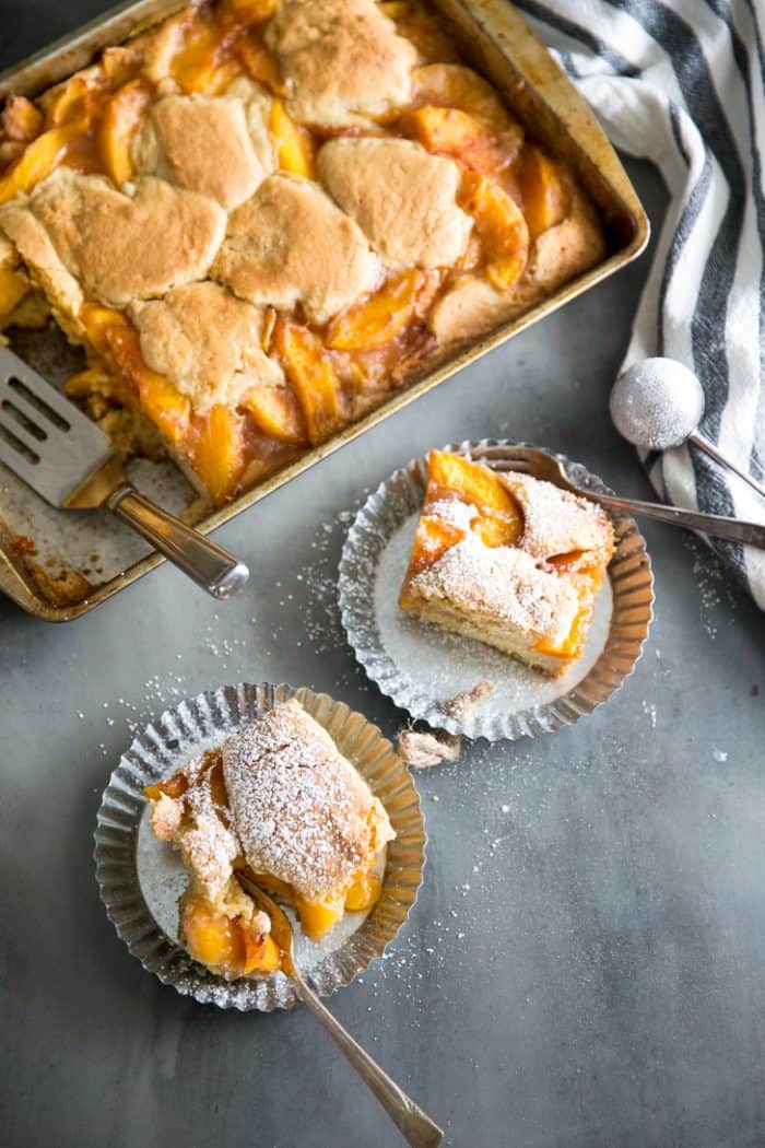 peach cobbler bars two on a plate next two the pan