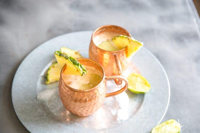 Moscow mule drink two copper mugs