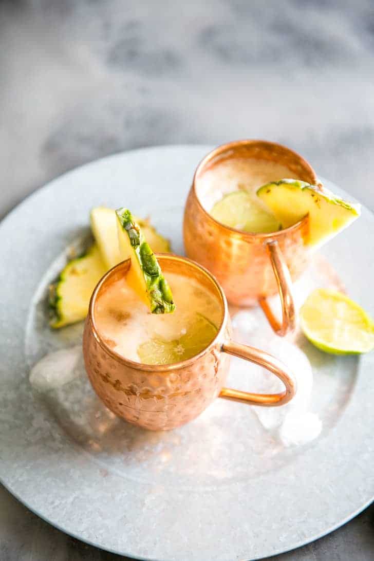 Pina Colada Moscow Mule Drink on a tray  Pina Colada Moscow Mule Drink Coconut Rum Moscow Mule
