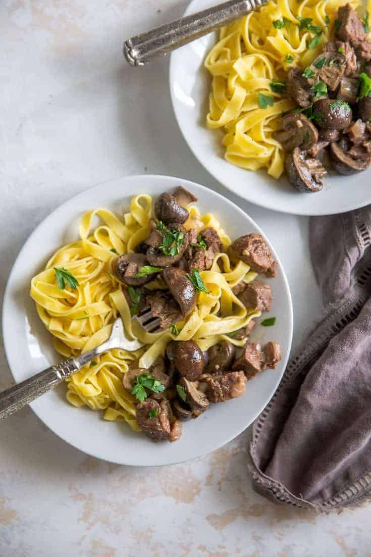 crockpot beef pointers with fork  Crockpot Beef Pointers with Noodles Crockpot Beef Tips and Noodles 8 735x1103
