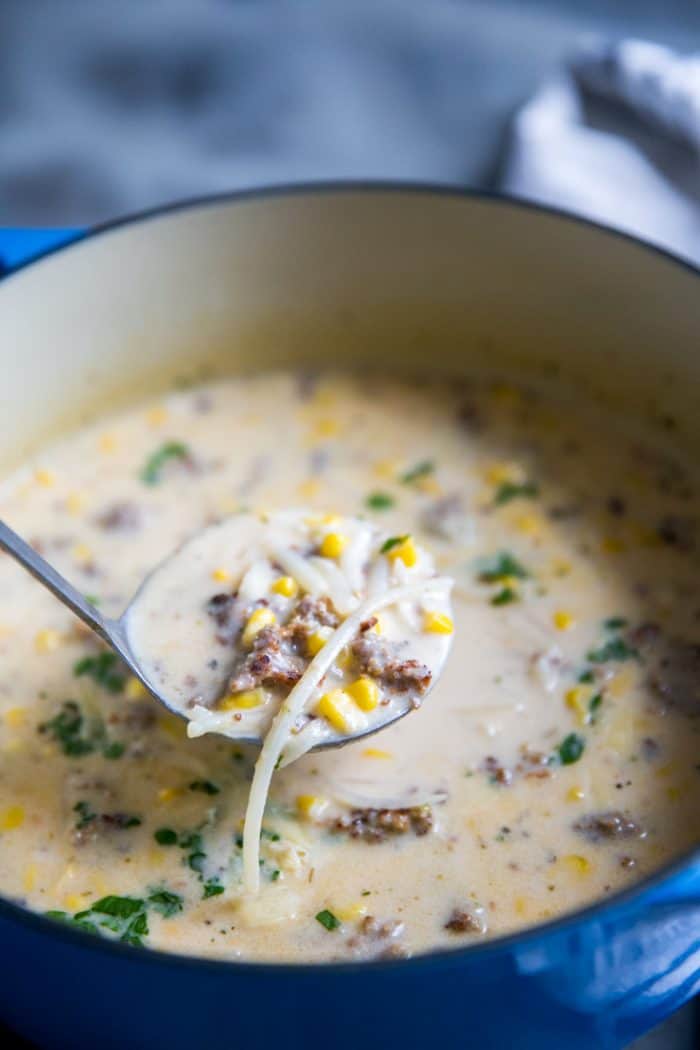 corn chowder soup with a ladle