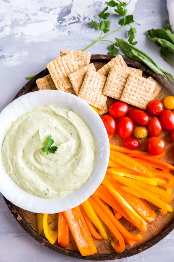 Green goddess dip on brown tray