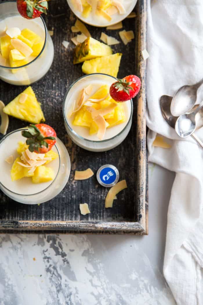 Panna Cotta in a tray with spoons on the side