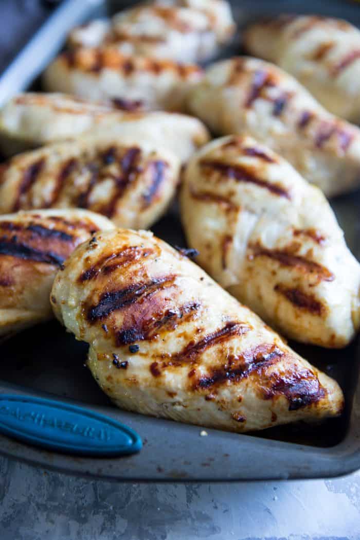 grilled chicken breast on a baking tray