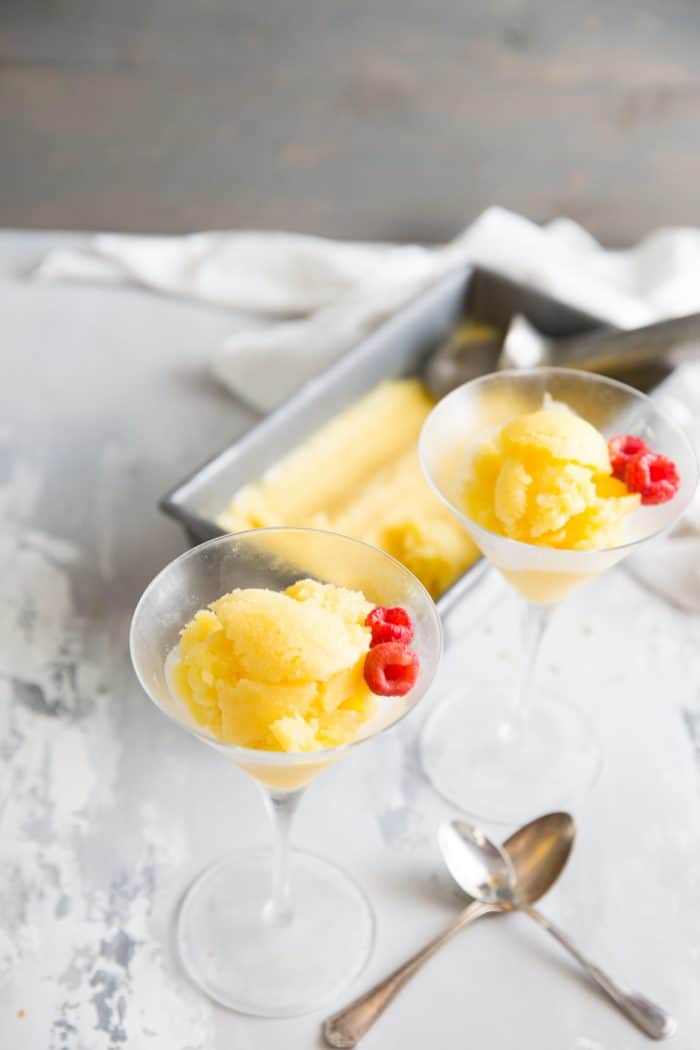 mango sorbet rum punch recipe two glasses and container