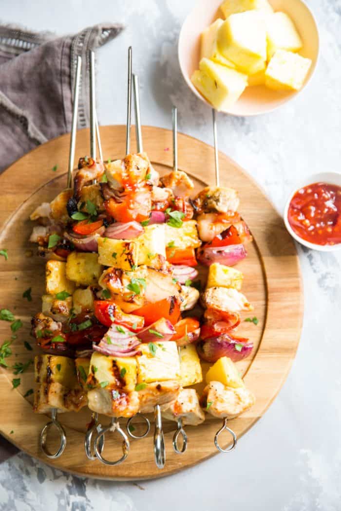 Pineapple Chicken Kabobs on a brown tray