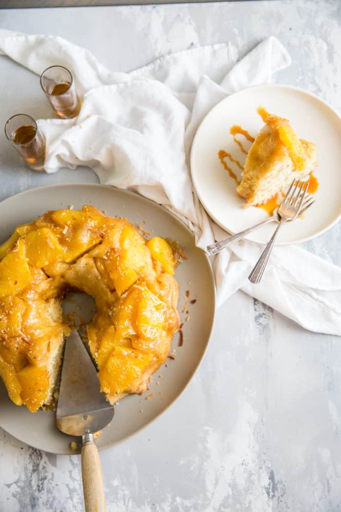 pineapple rum cake whole and a slice on the side