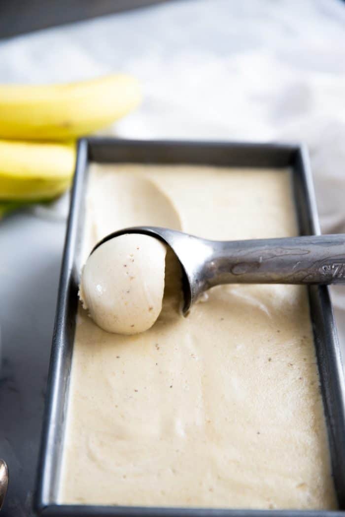 scooping banana ice cream