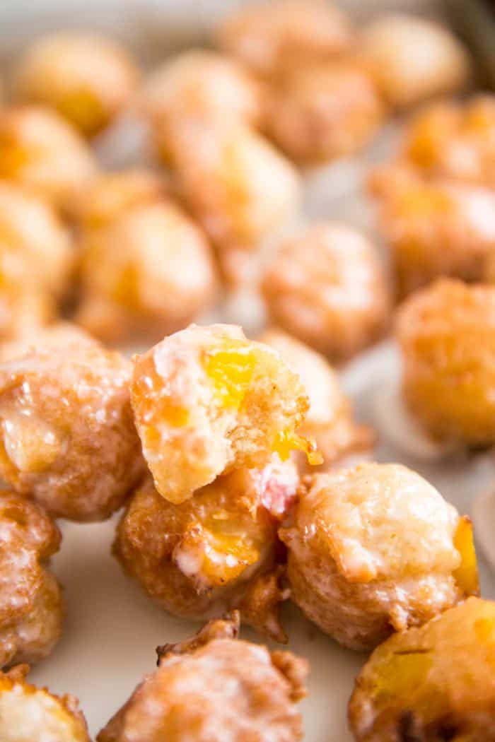 peach fritter with a bite 