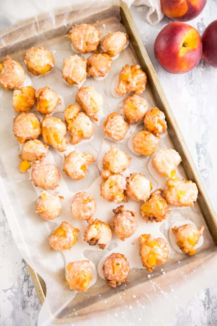 tray of peach fritters