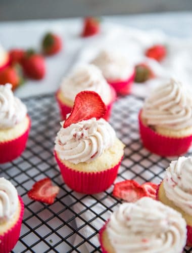 Strawberry cupcake one topped with a berry slice