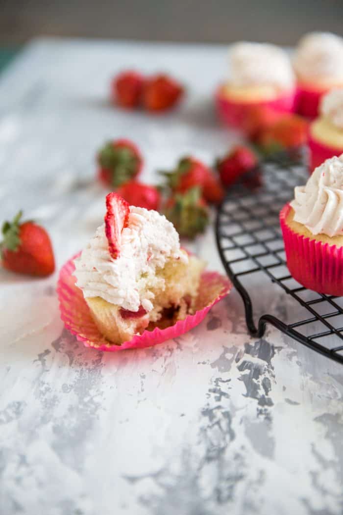 strawberry cupcake with a bite