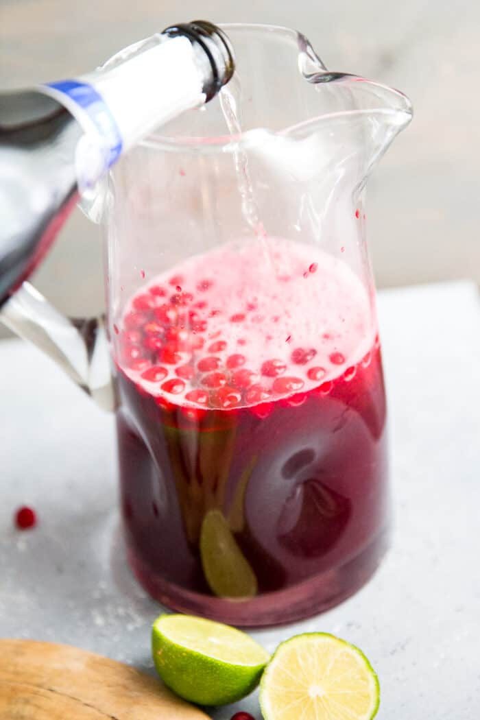 champagne drink with cranberries