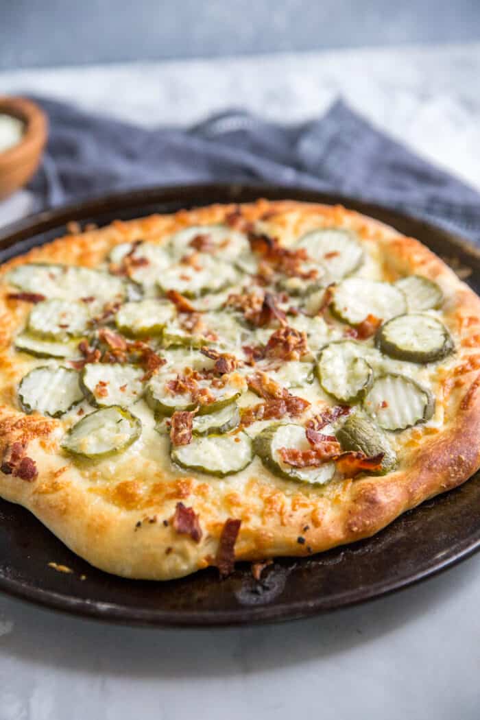Pickle pizza with bacon