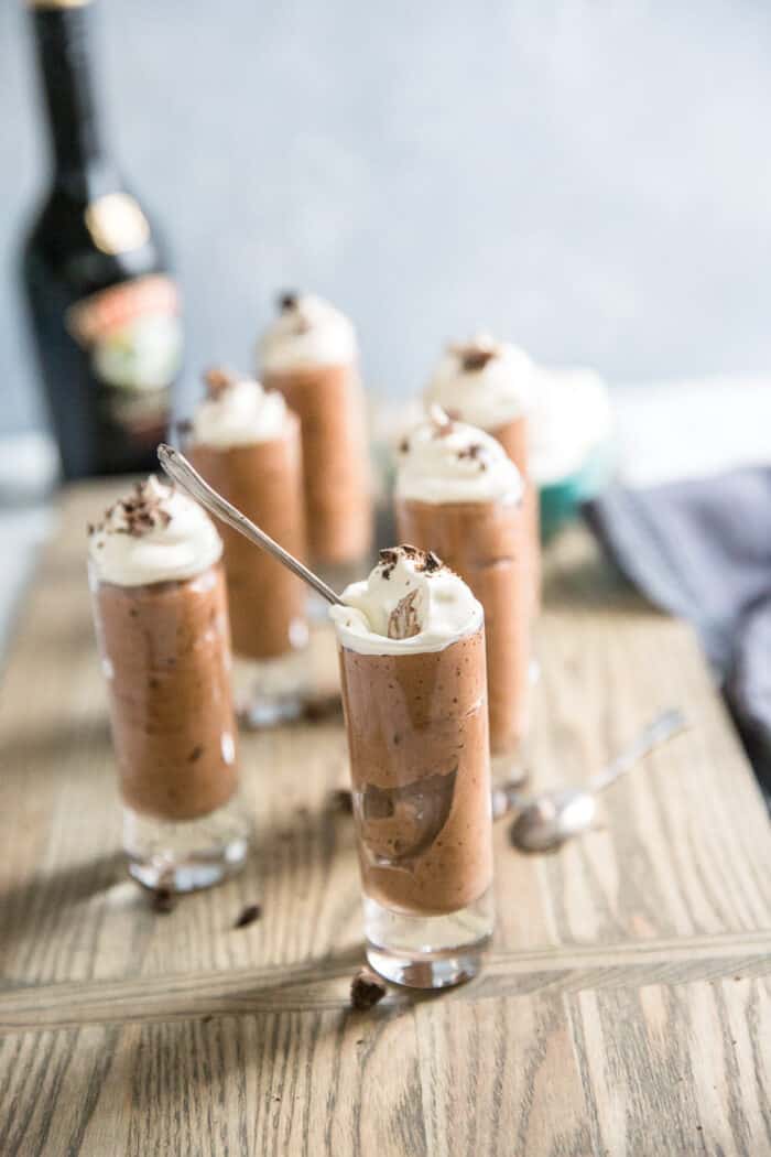 Irish coffee pudding shots one with a spoon