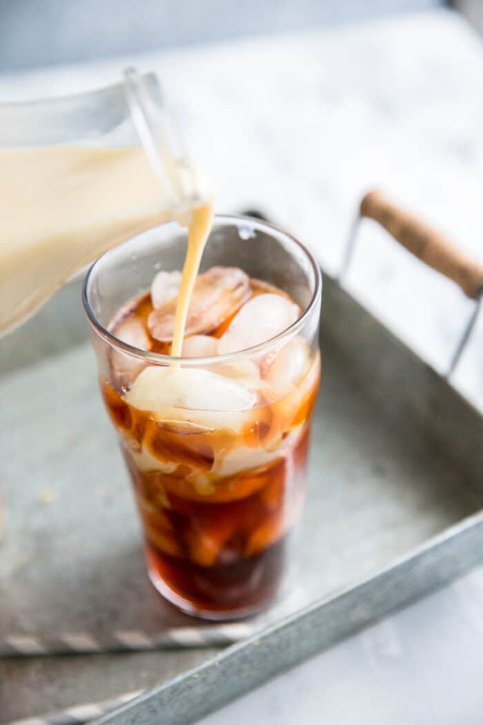 cold brew coffee recipe milk getting poured in