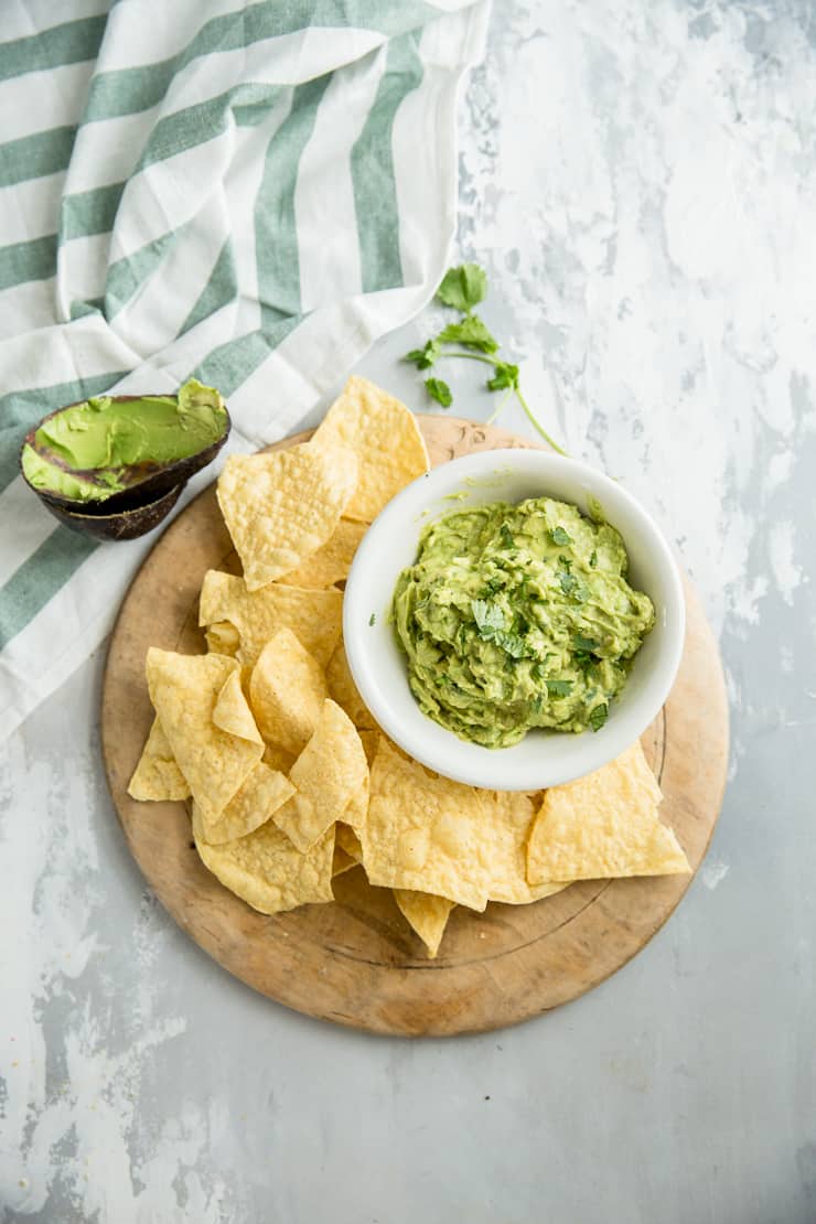 easy guacamole recipe with chips on the side