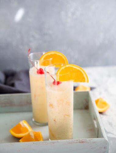 spiced rum cocktail with oranges slices