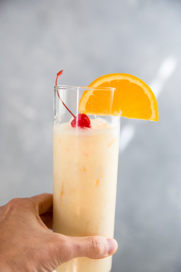 held Ambrosia spiced rum cocktail