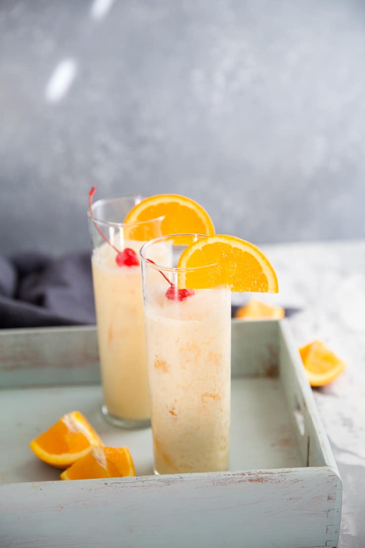 spiced rum cocktail with oranges slices