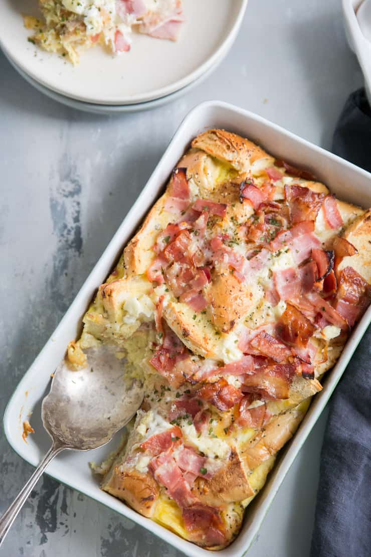 egg casserole with spoon in dish