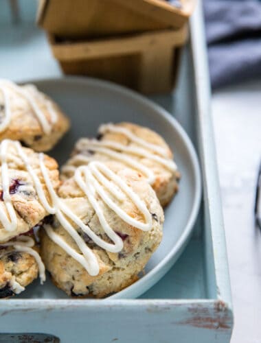 blueberry scones on a plate and a tray