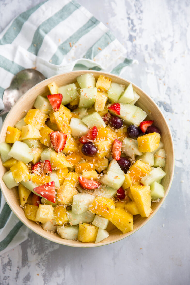 fruit salad in a tan bowl