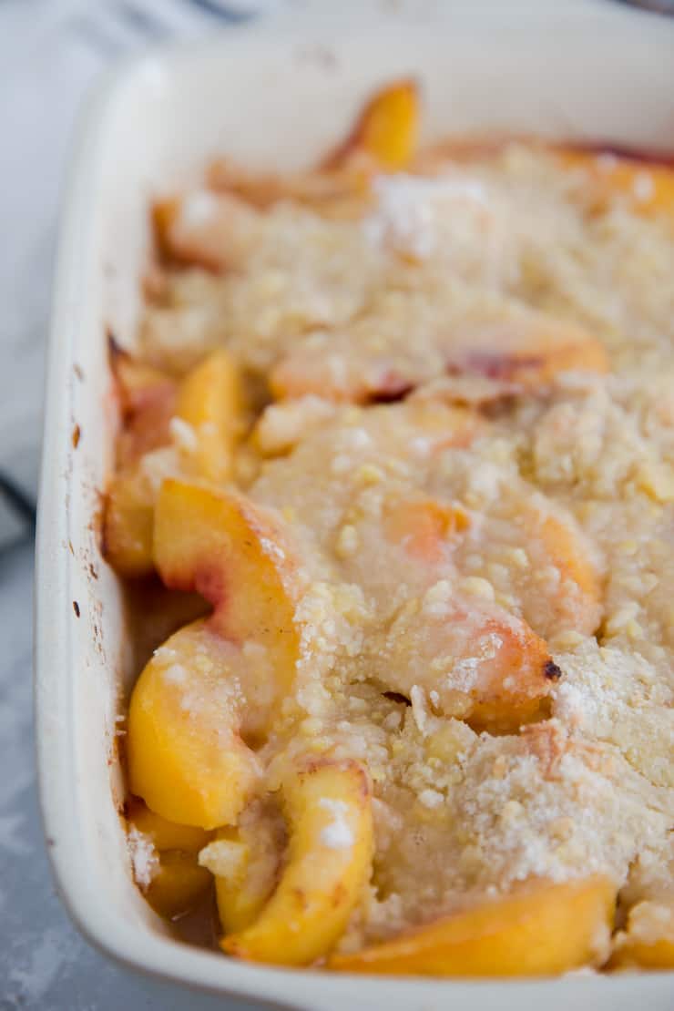 close up few of peach cobbler from the side
