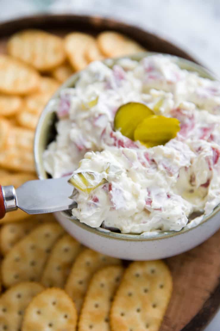 dill pickle dip with spreading knife