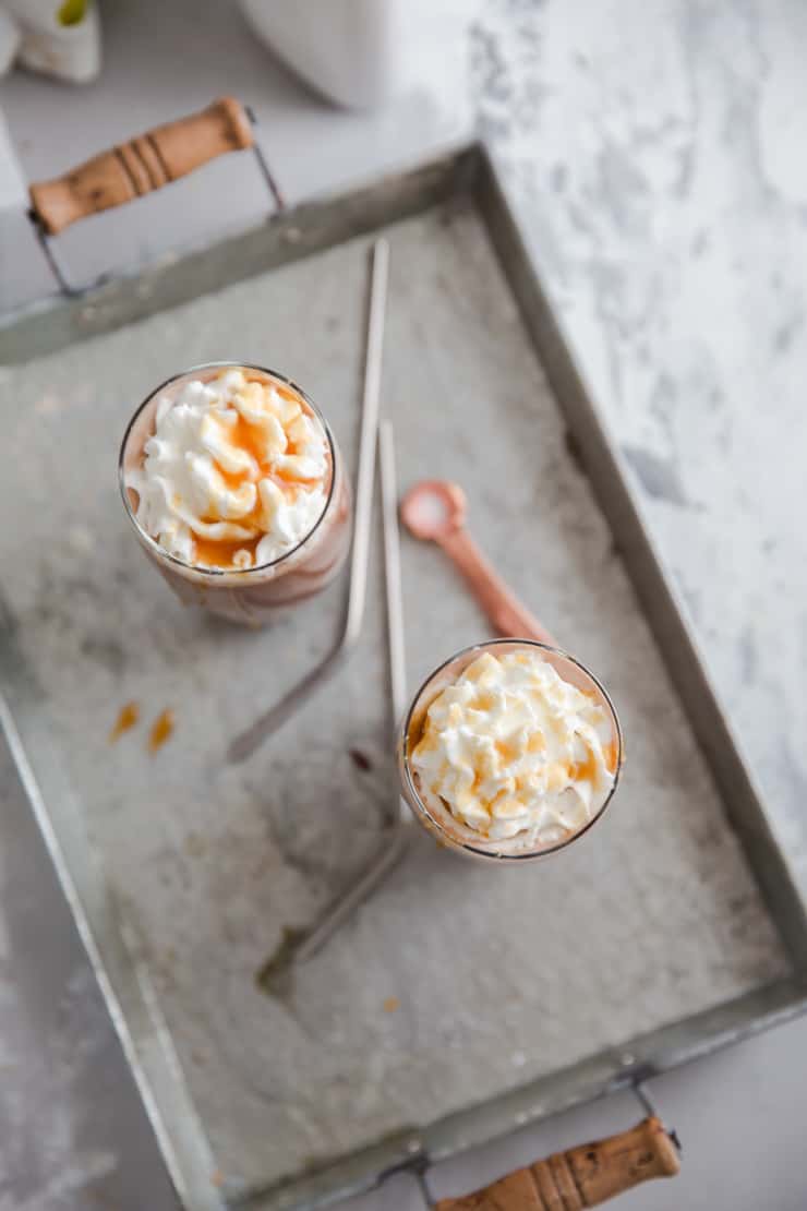 two iced mochas in a silver tray