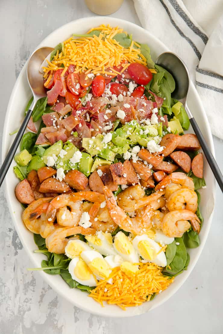 creole shrimp cobb salad ready to be served